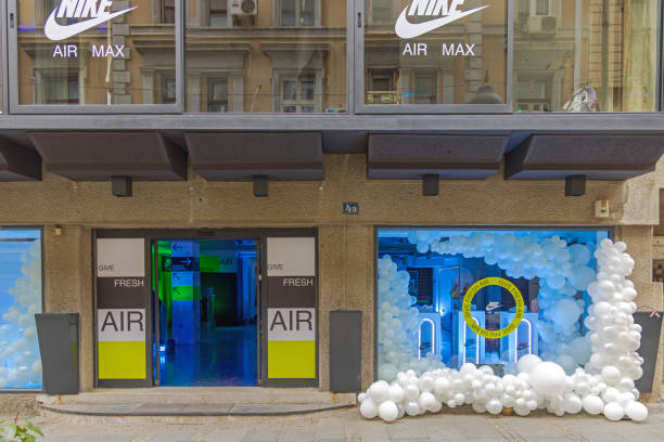 Nike Air Max Fresh Belgrade, Serbia - April 17, 2022: Nike Air Max Promotion Give Fresh White Cloud Balloons Party Decor at Footwear Shop. nike air photos stock pictures, royalty-free photos & images