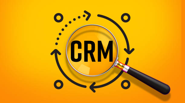istock CRM concept with magnifying glass and circular arrows, bright yellow background, black text, business infographic, customer relationship management, minimalist design, vector icons, flat design. 3D render. 2185158402