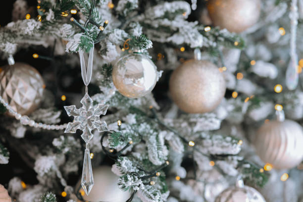 istock Elegant Christmas tree decorated with silver ornaments and sparkling lights 2185163066