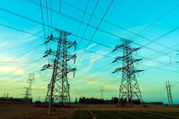 istock Pylons, high voltage pylons in the evening 2185166547