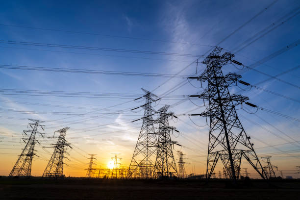 istock Pylons, high voltage pylons in the evening 2185166550