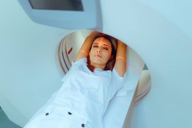 istock Female patient undergoing an MRI or CT scan 2185170276