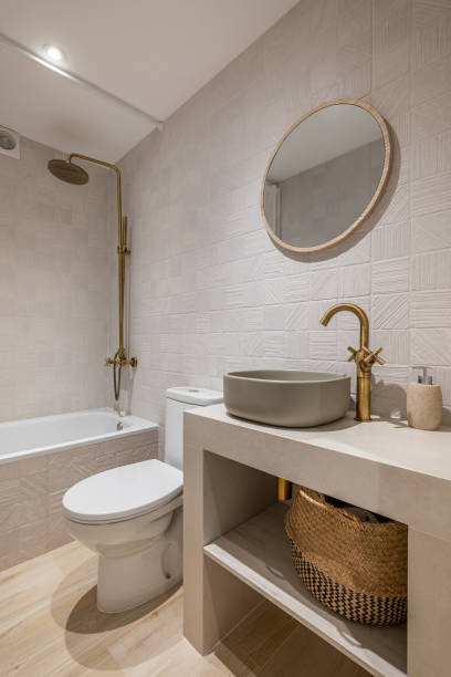istock Explore Innovative Modern Bathroom Designs Featuring Luxurious Gold Fixtures and Natural Elements 2185174908