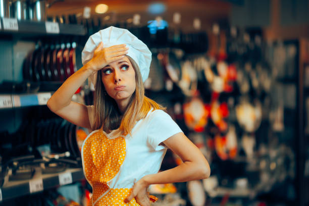 istock Stressed Chef Choosing the Perfect Pan in a Supermarket 2185177882