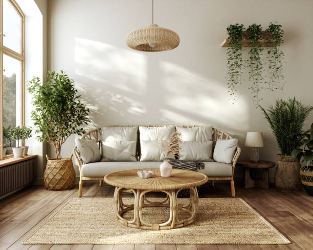 Boho-Inspired Modern Scandinavian Interior With Wicker Furniture and Green Plants Living room designed in a Scandinavian style with boho-inspired elements, featuring wicker furniture, wooden flooring, and a neutral color palette. interior decor stock pictures, royalty-free photos & images