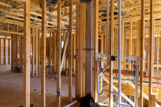 istock Construction work in progress at a residential building with exposed framing plumbing details visible 2185180222