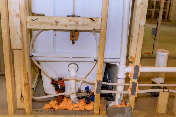 istock Plumbing connecting bath installation construction in residential building under renovation at modern setting 2185180225