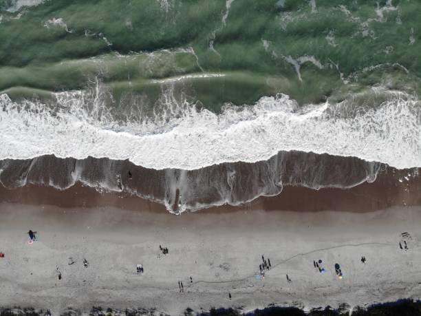 istock Drone View of Ocean Waves Crashing in Stunning Patterns 2185182343