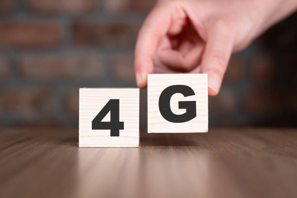 istock 4G word with wooden blocks on table 2185186704