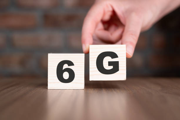 6G word with wooden blocks on table