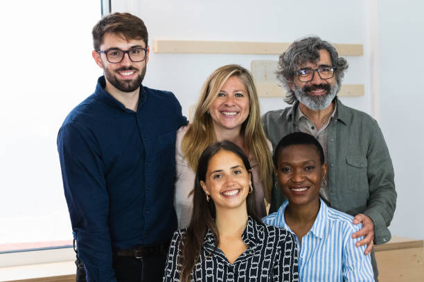 istock Cheerful diverse coworking women looking at camera 2185188465