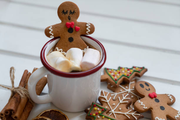 istock Gingerbread man bathing in cup of hot chocolate 2185189433