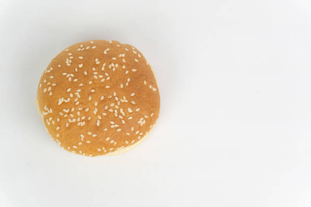 istock Hamburger buns with sesame seeds on white isolated background 2185192537