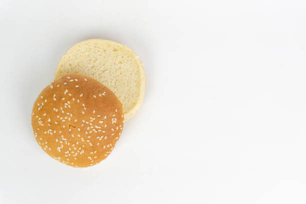 istock Hamburger buns with sesame seeds on white isolated background 2185192553