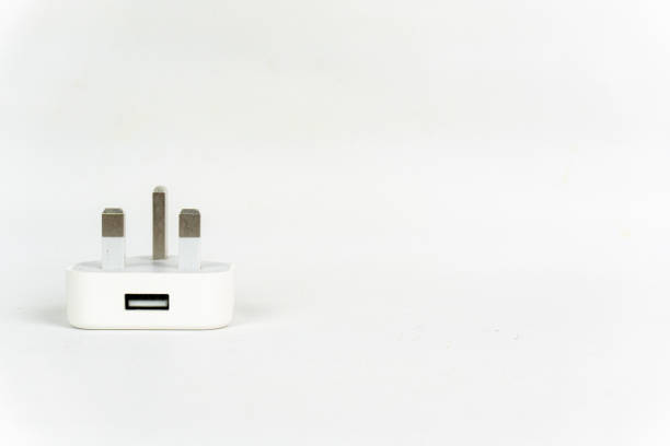 istock 3 pin UK standard plug unplugged on white grey background. electric plug concept. 2185192655