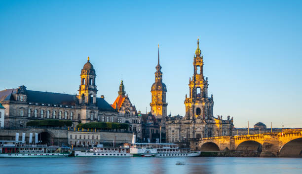 istock Early Moring Sunlight Falling onto the Dresden Cathedral and Elbe River, Germany 2185194114