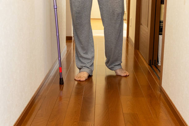 istock A person walking down a corridor with a cane 2185195098