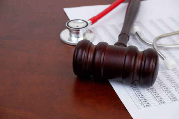 istock Judge gavel, stethoscope and financial document 2185197391
