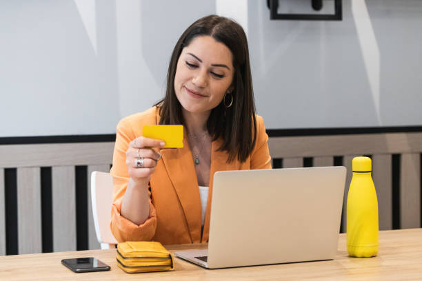 istock Happy woman making payment during online shopping 2185197588