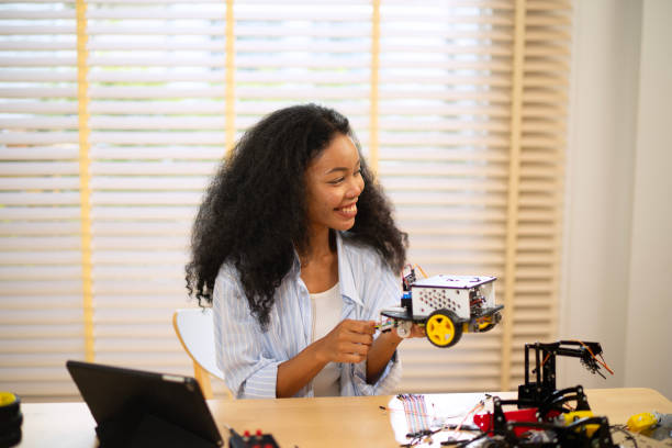 istock University student is brainstorming for build robot. 2185202404