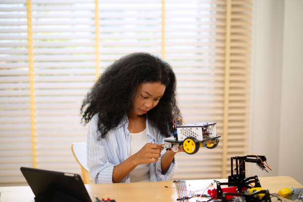 istock University student is brainstorming for build robot. 2185202416
