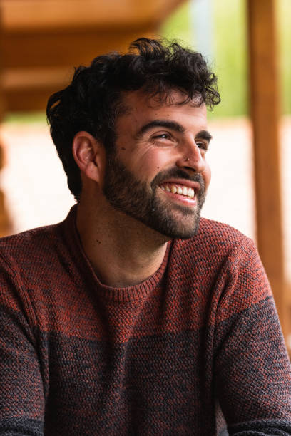 istock Cheerful man chilling on terrace and looking away 2185206416