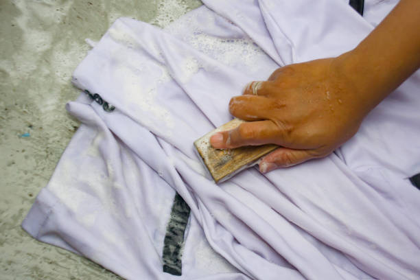 istock Rubbing with a clothes brush when washing 2185207595