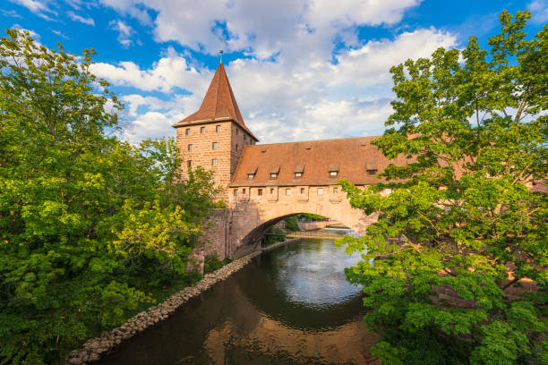 Schlayerturm is a beautiful historical landmark over the Pegnitz River in Nuremberg, a city in Bavaria, Germany