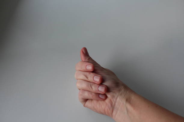 istock Right female hand with short unpainted nails 2185211056
