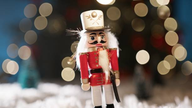 istock Christmas Nutcrackers Lined Up In Front Of The Tree 2185213166