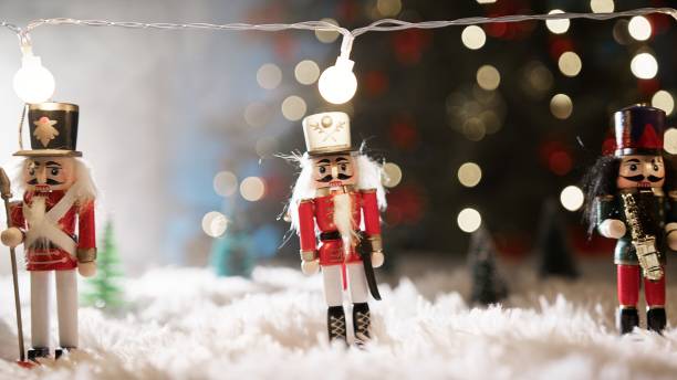 istock Christmas Nutcrackers Lined Up In Front Of The Tree 2185213195