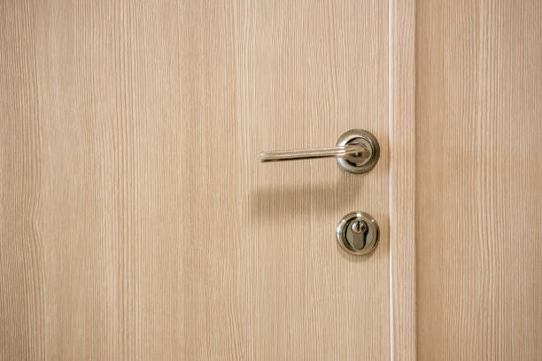 istock the door handle and lock on the white door 2185213859