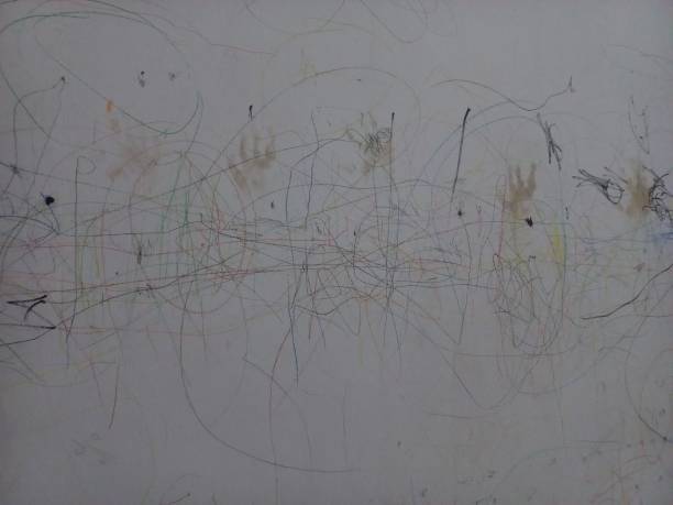 istock toddler doodles on the wall 2185214138