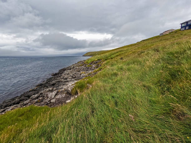 istock Steep Grassy Mountain Overlooking the North Atlantic Ocean 2185219951