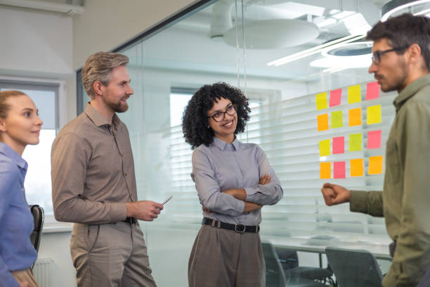 istock Creative group or business people planning innovation with sticky notes on glass wall. 2185223597