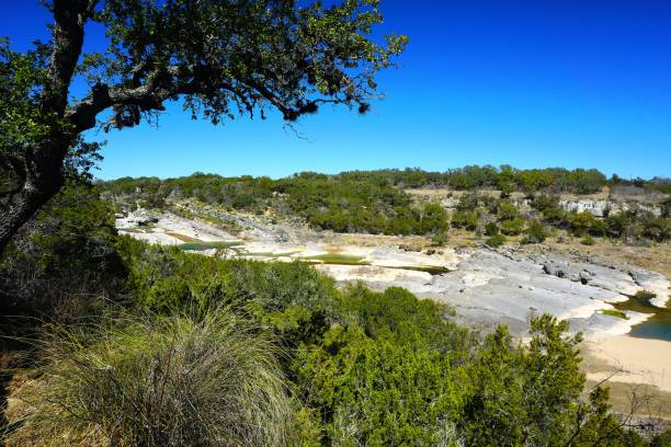istock The Pedernales River flows, erodes, and channels through Hill Country Limestone creating dramatic pools, falls, and springs at Pedernales Falls State Park near Austin Texas in  Travis County 2185223743