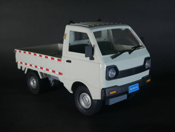 istock A white toy truck highlighted against a shadowy backdrop 2185225416