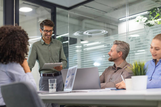istock Business team discussing together business plans in office. 2185225903