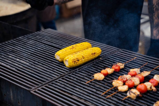 istock Delicious corn on the cob is currently being cooked on a hot grill, creating a mouthwatering and flavorful treat that is perfect for any outdoor gathering or summer barbecue event 2185228188
