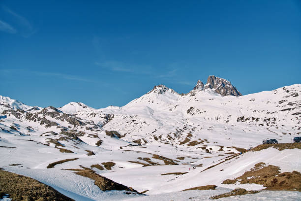 istock Snowy hilly landscape under blue sky 2185230218