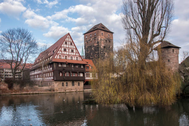 Houses and towers in the landscape on the River Pegnitz in Nuremberg, Germany