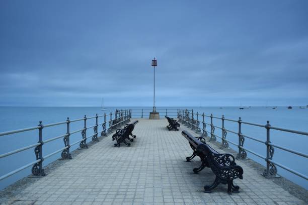 istock Symmetry and peace on Dorset pier 2185232641