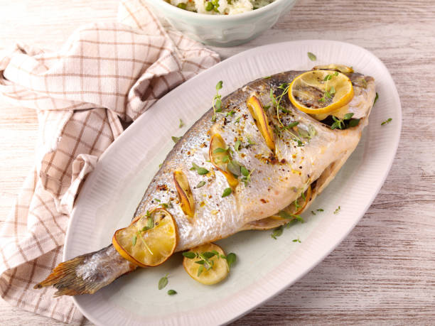 istock Baked lemon and thyme whole sea bream 2185234362