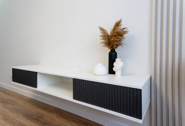 istock A beautifully designed Modern and Minimalist Wall Shelf, showcasing decorative vases for an elegant home display 2185236027