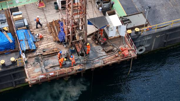 salvador, bahia, brazil - october 11, 2024: ferry drills into the ground of Todos os Santos Bay to conduct a survey for the construction of the Salvador Itaparica bridge.