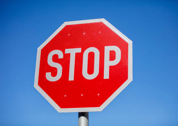 Stop traffic sign isolated on white background. Highway code. No entry. Front view. 3d render