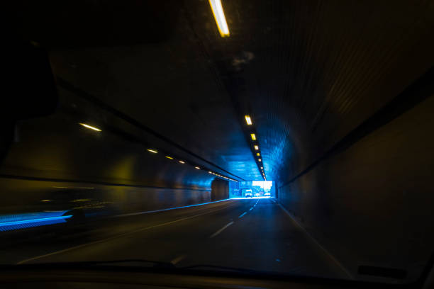 driving car in tunnel.