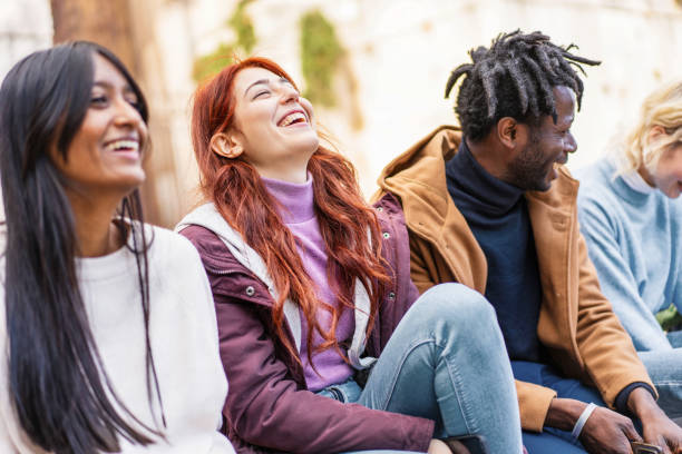 istock Diverse friends laughing outdoors, multicultural group enjoying time together, inclusive friendship portrait 2185244784