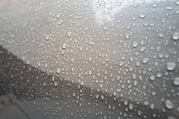 istock Raindrops on the body of the car 2185250603