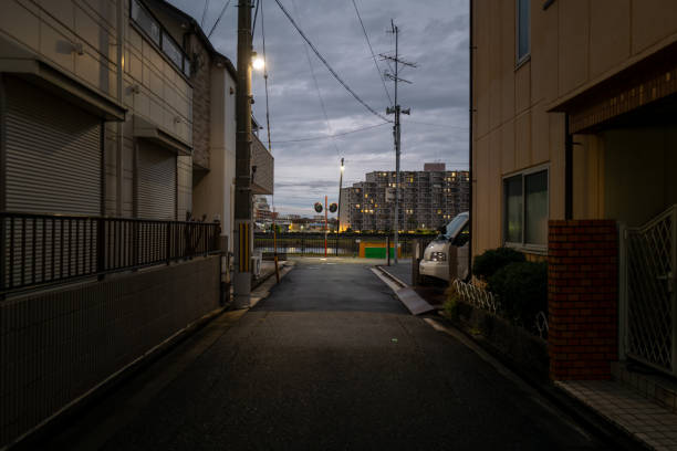 istock Dimly lit alleyway scenes at night. 2185251734